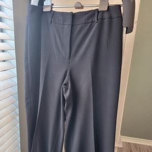 Chicos black flared leg capris Sz 1.5